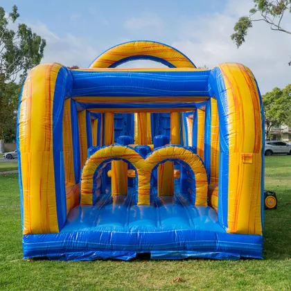 46ft dual-lane inflatable obstacle course rental front entrance — real setup in Lakeland, FL