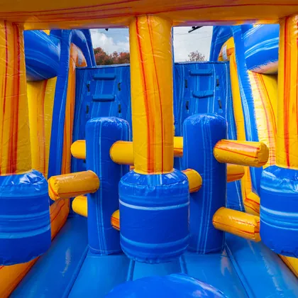 Inside the 46ft inflatable obstacle course rental — pop-ups, climbing walls and dual lanes in Lakeland, FL