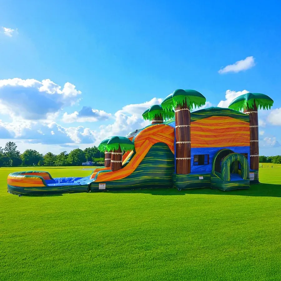 Mega Cali Palms tropical combo bounce house with dual-lane slide and splash pool — real backyard setup in Lakeland, FL