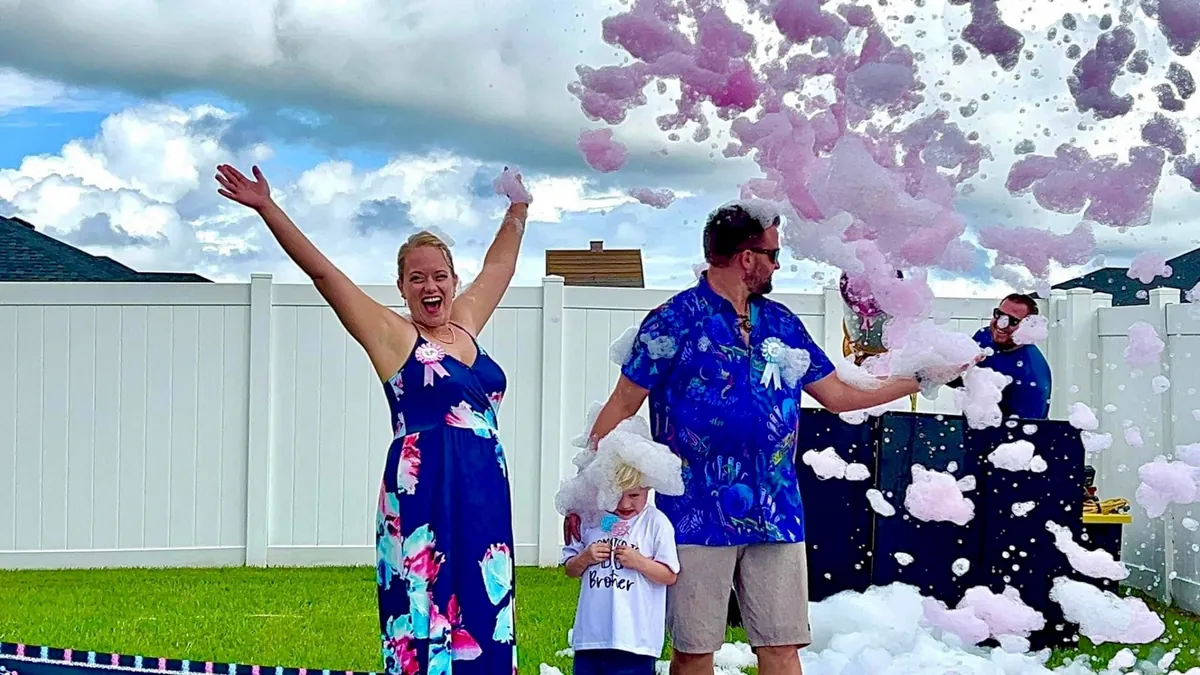 Family enjoying a pink foam party rental in Lakeland, FL
