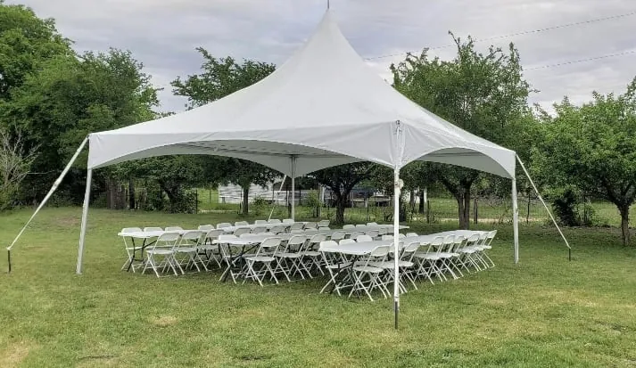 Tent, table and chair rental setup for outdoor party in Lakeland, FL